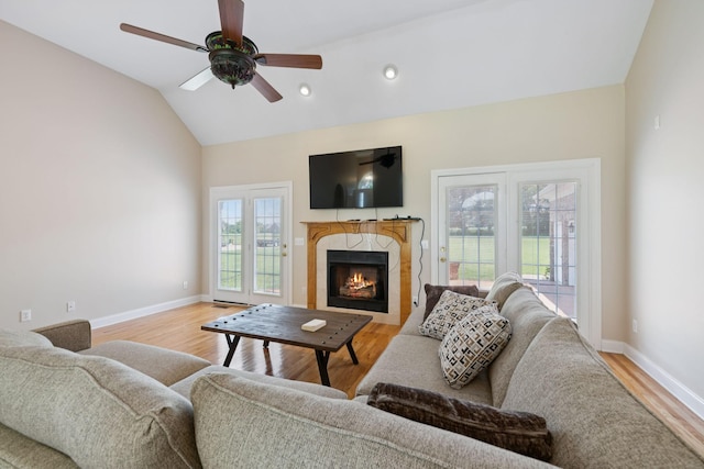 6913 Zion Crossing Ct, Columbia, TN 38401 - living room featuring light wood finished floors, a tile fireplace, vaulted ceiling, ceiling fan, and recessed lighting
