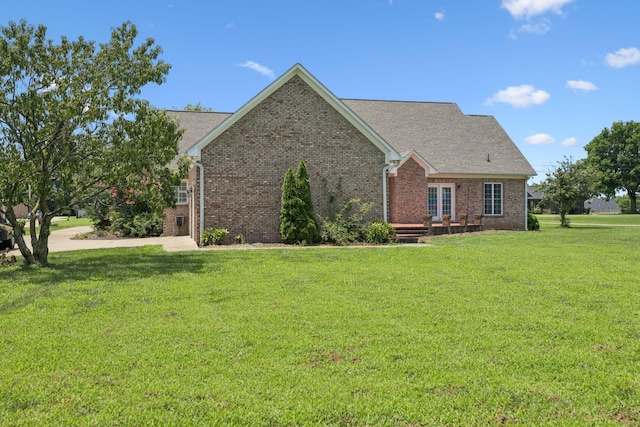 6913 Zion Crossing Ct, Columbia, TN 38401 - view of home's exterior featuring a lawn and brick siding