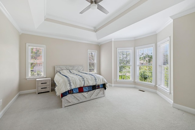 6913 Zion Crossing Ct, Columbia, TN 38401 - carpeted bedroom featuring a tray ceiling, multiple windows, crown molding, and ceiling fan