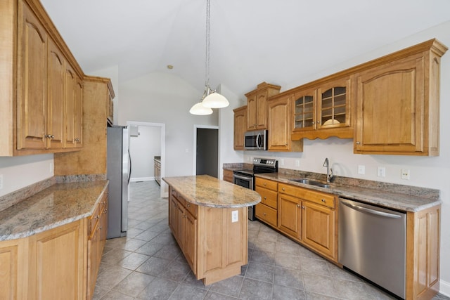 6913 Zion Crossing Ct, Columbia, TN 38401 - kitchen with appliances with stainless steel finishes, lofted ceiling, a kitchen island, light stone countertops, and glass insert cabinets