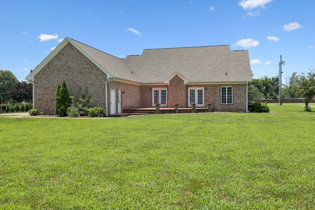 6913 Zion Crossing Ct, Columbia, TN 38401 - view of front of property featuring french doors, a front yard, brick siding, and a shingled roof
