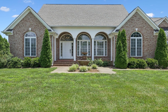 6913 Zion Crossing Ct, Columbia, TN 38401 - view of front of property with brick siding, a front lawn, and roof with shingles