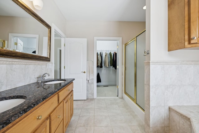 6913 Zion Crossing Ct, Columbia, TN 38401 - full bath with a shower stall, double vanity, a walk in closet, and tile patterned flooring