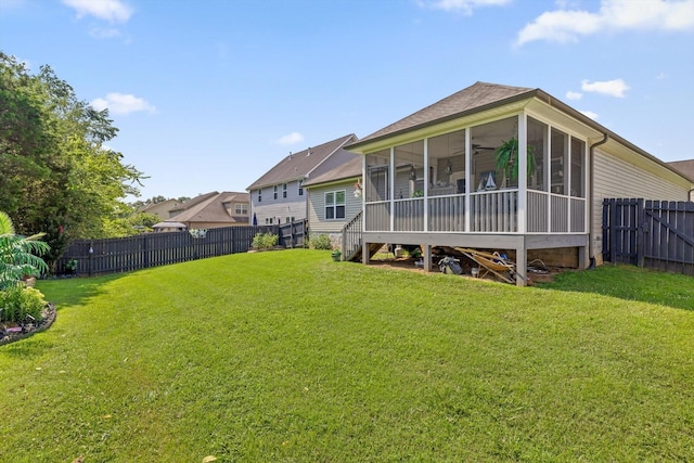 7560 Hampstead Hall Dr, Ooltewah, TN 37363 - back of house featuring a sunroom, a fenced backyard, and a ceiling fan