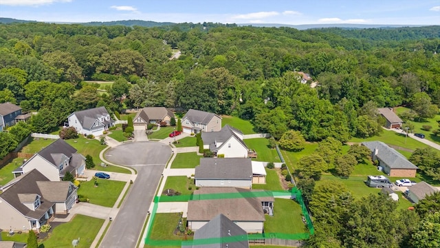 7560 Hampstead Hall Dr, Ooltewah, TN 37363 - aerial perspective of suburban area with a forest