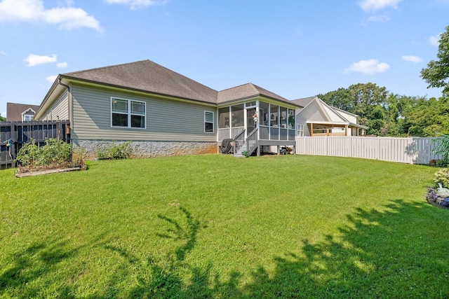 7560 Hampstead Hall Dr, Ooltewah, TN 37363 - back of house with a sunroom