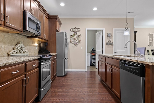 7560 Hampstead Hall Dr, Ooltewah, TN 37363 - kitchen featuring appliances with stainless steel finishes, ornamental molding, dark wood-style floors, backsplash, and light stone countertops