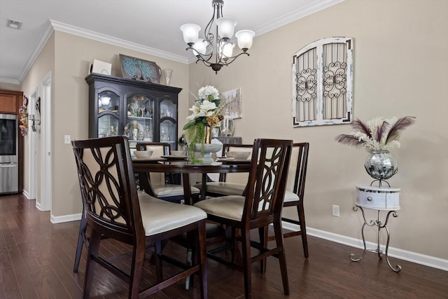 7560 Hampstead Hall Dr, Ooltewah, TN 37363 - dining area featuring a chandelier, dark wood-style flooring, and crown molding