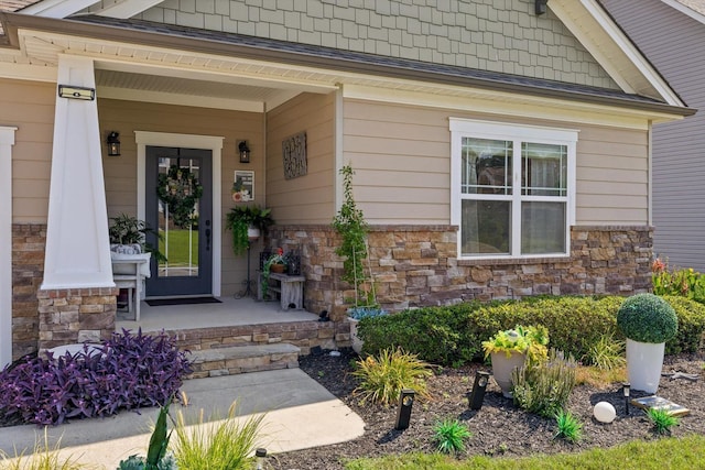 7560 Hampstead Hall Dr, Ooltewah, TN 37363 - view of exterior entry with stone siding and covered porch