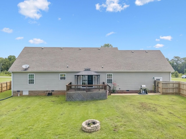 1493 Azalee Ln, Chapel Hill, TN 37034 - back of house featuring crawl space, a gazebo, a shingled roof, a fenced backyard, and a fire pit