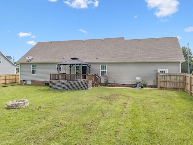 1493 Azalee Ln, Chapel Hill, TN 37034 - back of property featuring a gazebo, crawl space, a fire pit, a fenced backyard, and roof with shingles