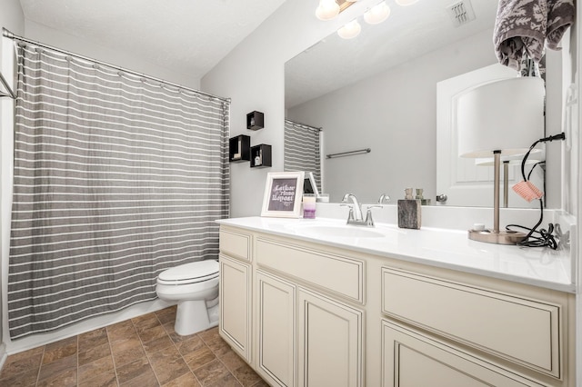 1906 Charismatic Pl, Murfreesboro, TN 37128 - bathroom featuring vanity, stone finish floors, and curtained shower