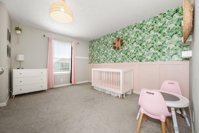 1906 Charismatic Pl, Murfreesboro, TN 37128 - carpeted bedroom featuring a crib, wallpapered walls, and a textured ceiling