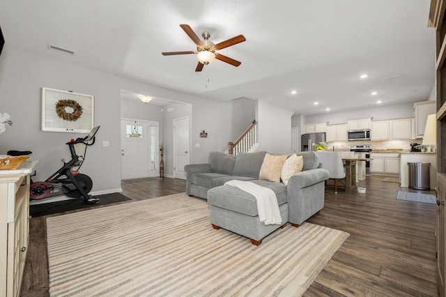 1906 Charismatic Pl, Murfreesboro, TN 37128 - living room with ceiling fan, dark wood finished floors, stairs, and recessed lighting