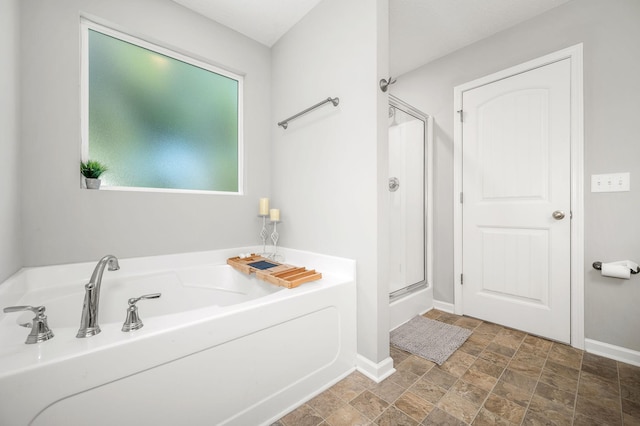 1906 Charismatic Pl, Murfreesboro, TN 37128 - full bathroom featuring stone finish floors, a bath, and a stall shower