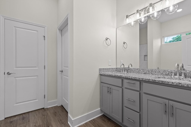 212 Mcbrien Rd, Chattanooga, TN 37411 - full bathroom with wood finished floors and double vanity