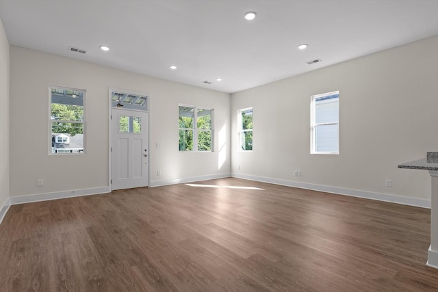 212 Mcbrien Rd, Chattanooga, TN 37411 - unfurnished living room with healthy amount of natural light, wood finished floors, and recessed lighting
