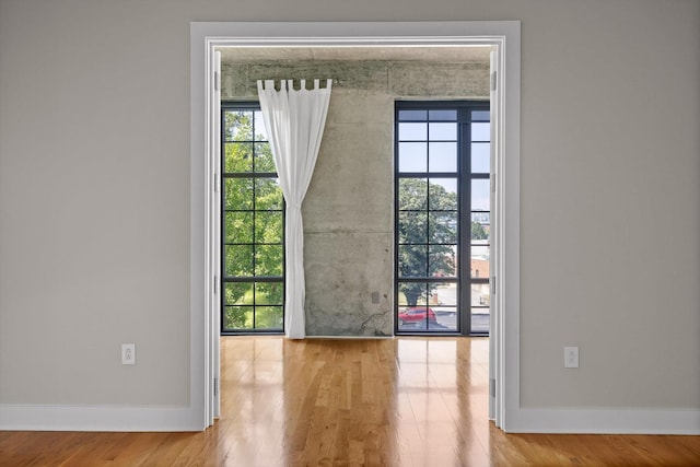 417 Frazier Ave Unit 303, Chattanooga, TN 37405 - spare room featuring baseboards and wood finished floors