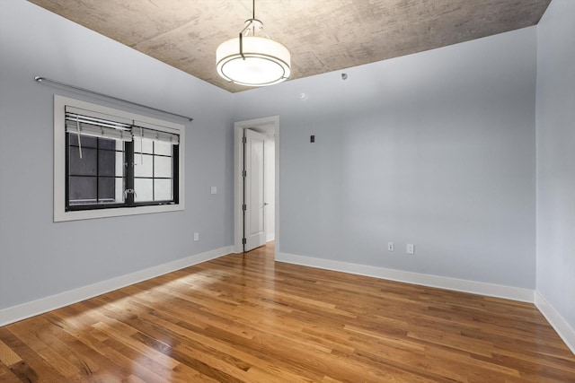 417 Frazier Ave Unit 303, Chattanooga, TN 37405 - spare room featuring light wood-style floors and baseboards