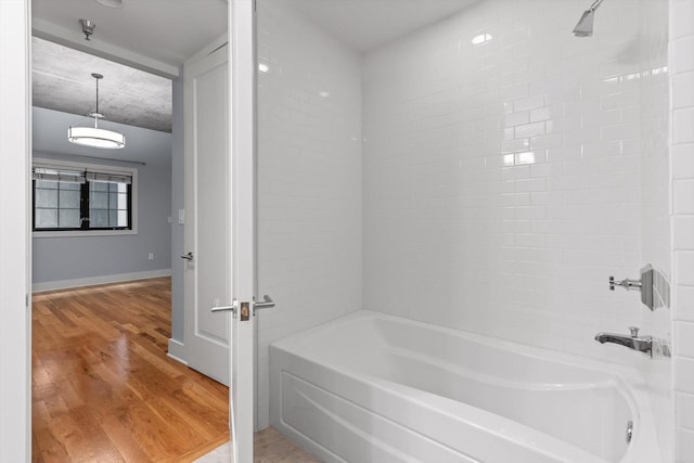 417 Frazier Ave Unit 303, Chattanooga, TN 37405 - full bath with wood finished floors and shower / washtub combination
