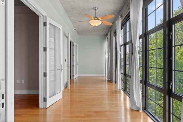 417 Frazier Ave Unit 303, Chattanooga, TN 37405 - hallway featuring light wood finished floors, french doors, and plenty of natural light