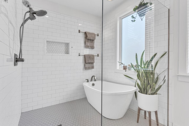 2806 Marlin Ave, Nashville, TN 37215 - full bath featuring a soaking tub, a tile shower, tile patterned floors, and tile walls
