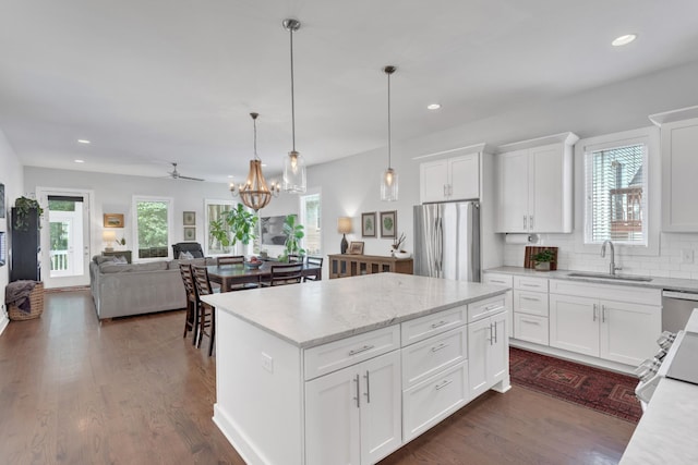 2806 Marlin Ave, Nashville, TN 37215 - kitchen featuring appliances with stainless steel finishes, recessed lighting, healthy amount of natural light, dark wood-style flooring, and hanging light fixtures