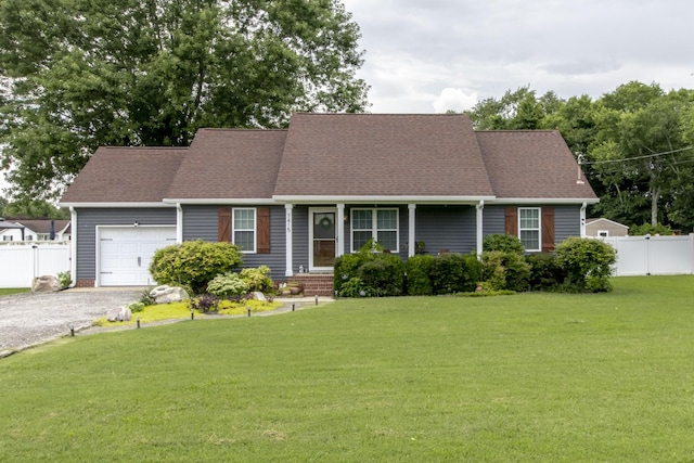 7415 Antietam Ln, Murfreesboro, TN 37130 - view of front of house with an attached garage, gravel driveway, and roof with shingles