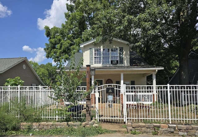 721 Myrtle St, Kingsport, TN 37660 - view of front facade featuring covered porch and a fenced front yard