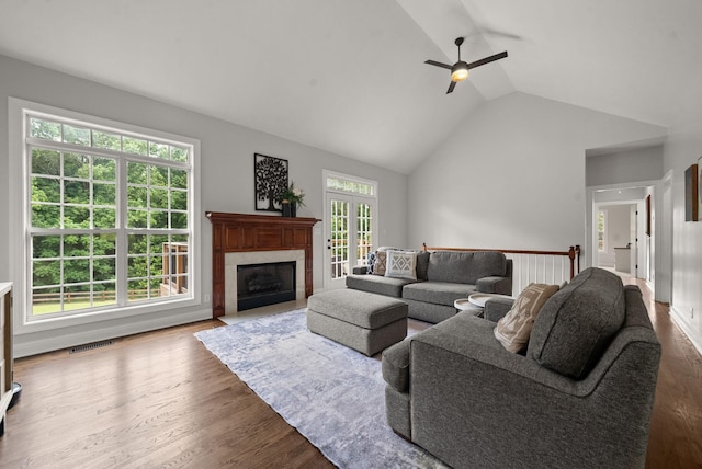 2386 Pleasant View Rd, Pleasant View, TN 37146 - living area featuring lofted ceiling, ceiling fan, wood finished floors, and a premium fireplace