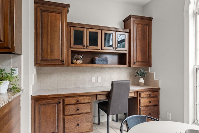 2386 Pleasant View Rd, Pleasant View, TN 37146 - home office with built in study area and light tile patterned flooring