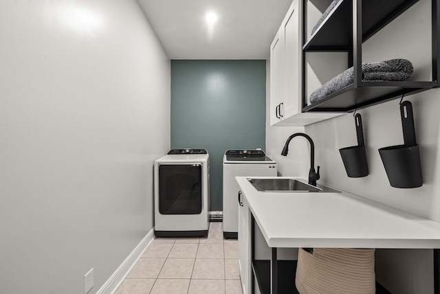 2386 Pleasant View Rd, Pleasant View, TN 37146 - laundry room featuring cabinet space, washing machine and clothes dryer, and light tile patterned floors
