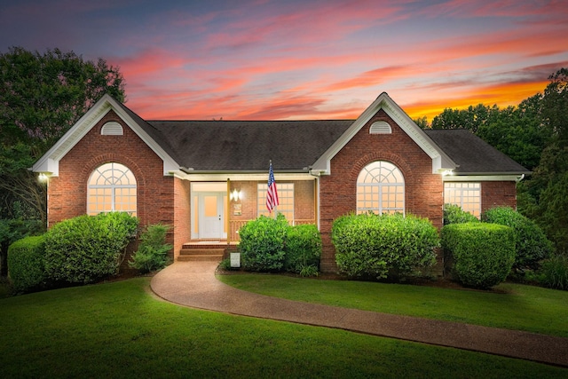 2386 Pleasant View Rd, Pleasant View, TN 37146 - single story home featuring brick siding, a lawn, and roof with shingles