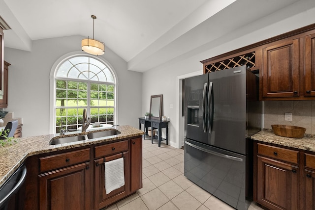 2386 Pleasant View Rd, Pleasant View, TN 37146 - kitchen with refrigerator with ice dispenser, vaulted ceiling, light tile patterned floors, decorative backsplash, and dishwasher