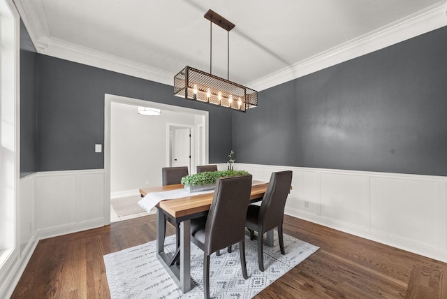 2386 Pleasant View Rd, Pleasant View, TN 37146 - dining space with a chandelier, ornamental molding, wood finished floors, and wainscoting
