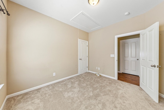 2438 Duxbury Dr, Columbia, TN 38401 - unfurnished bedroom featuring attic access and carpet flooring