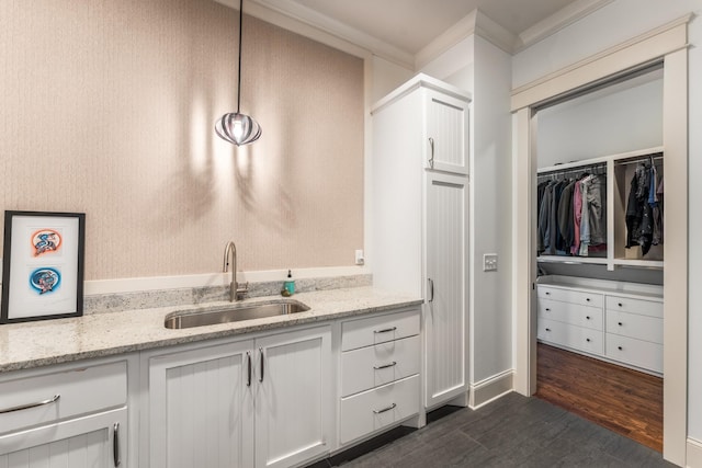 1727 Hillmont Dr, Nashville, TN 37215 - bathroom with ornamental molding, wood finished floors, a spacious closet, and vanity