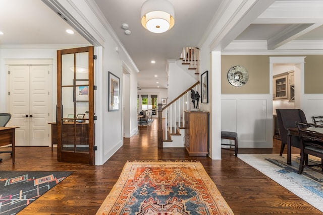 1727 Hillmont Dr, Nashville, TN 37215 - entryway featuring ornamental molding, stairs, dark wood-style floors, wainscoting, and a decorative wall