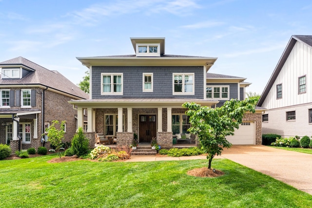1727 Hillmont Dr, Nashville, TN 37215 - view of front facade with brick siding, covered porch, concrete driveway, a front yard, and a garage