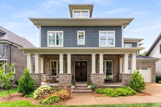 1727 Hillmont Dr, Nashville, TN 37215 - american foursquare style home with a porch, brick siding, an attached garage, and concrete driveway