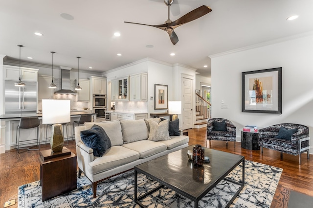 1727 Hillmont Dr, Nashville, TN 37215 - living area featuring crown molding, recessed lighting, ceiling fan, stairs, and wood finished floors
