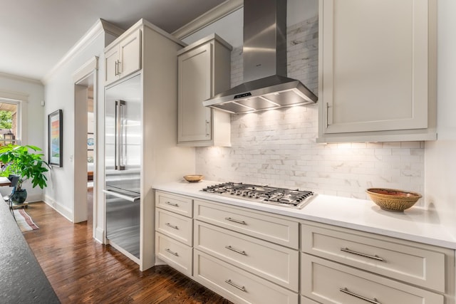 1727 Hillmont Dr, Nashville, TN 37215 - kitchen with wall chimney range hood, crown molding, stainless steel appliances, dark wood-style flooring, and tasteful backsplash