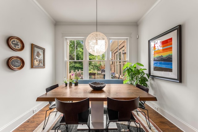 1727 Hillmont Dr, Nashville, TN 37215 - dining room featuring crown molding, wood finished floors, and a chandelier