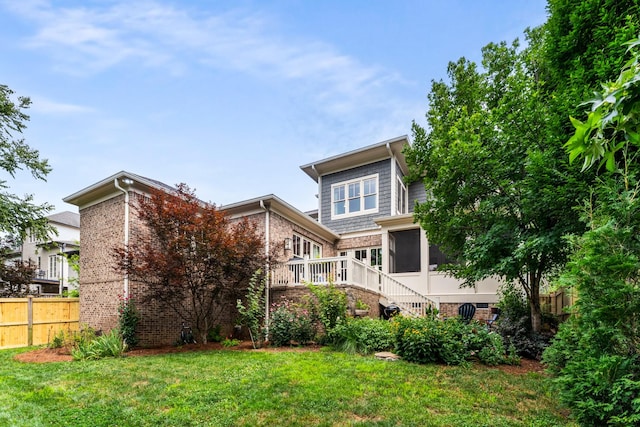 1727 Hillmont Dr, Nashville, TN 37215 - back of property featuring brick siding and a sunroom