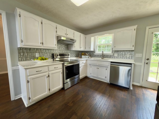 213 Ramsey Rd, Murfreesboro, TN 37127 - kitchen featuring appliances with stainless steel finishes, under cabinet range hood, white cabinets, light countertops, and a textured ceiling