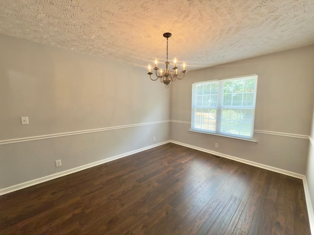 213 Ramsey Rd, Murfreesboro, TN 37127 - empty room with a textured ceiling, a chandelier, and dark wood-style flooring