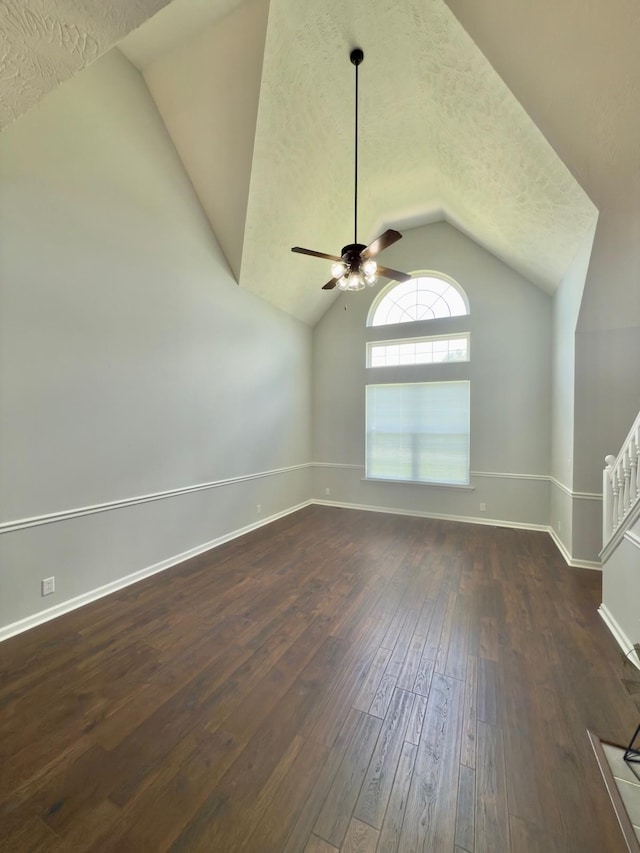 213 Ramsey Rd, Murfreesboro, TN 37127 - empty room featuring a textured ceiling, vaulted ceiling, a ceiling fan, and dark wood finished floors