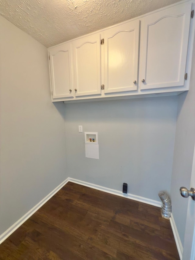 213 Ramsey Rd, Murfreesboro, TN 37127 - washroom featuring cabinet space, hookup for a washing machine, dark wood-type flooring, and a textured ceiling