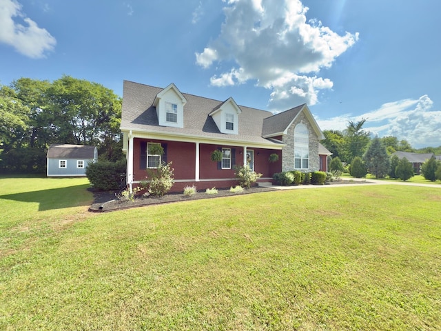 213 Ramsey Rd, Murfreesboro, TN 37127 - cape cod-style house featuring a front lawn and a porch