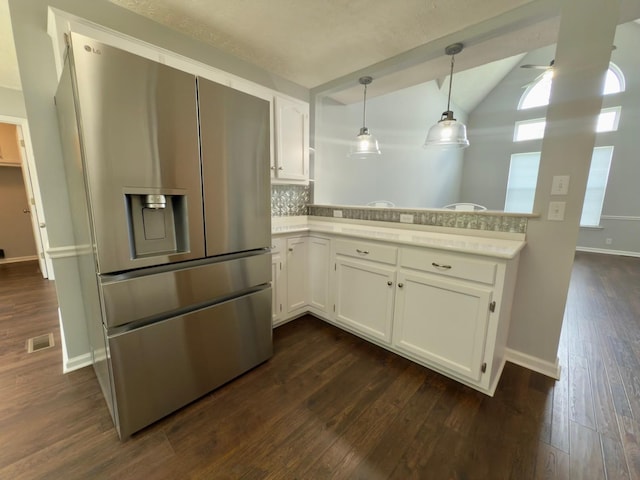 213 Ramsey Rd, Murfreesboro, TN 37127 - kitchen featuring stainless steel refrigerator with ice dispenser, light countertops, white cabinetry, dark wood-style flooring, and lofted ceiling